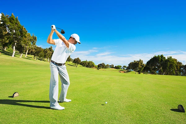 Golfer playing on greens