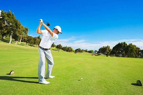 Golfer playing on greens 